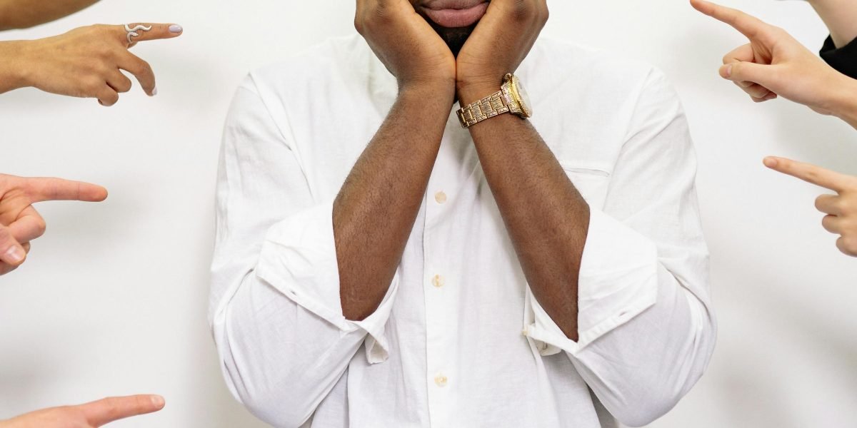 A person looks overwhelmed by streaming choices, illustrating the modern 'stream fatigue' crisis.